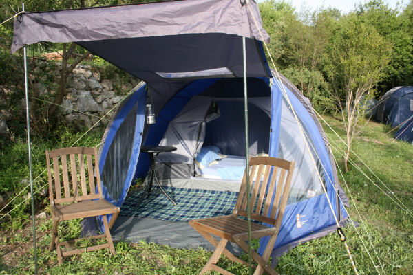 Cypress Lodge - €20 per person per night2-4 person tent with single sleeping area that can be divided into two compartments. Head height entrance lobby, side entrance and canopy porch opening. Curtained windows, storage pockets. Foam mattresses and bedding included.